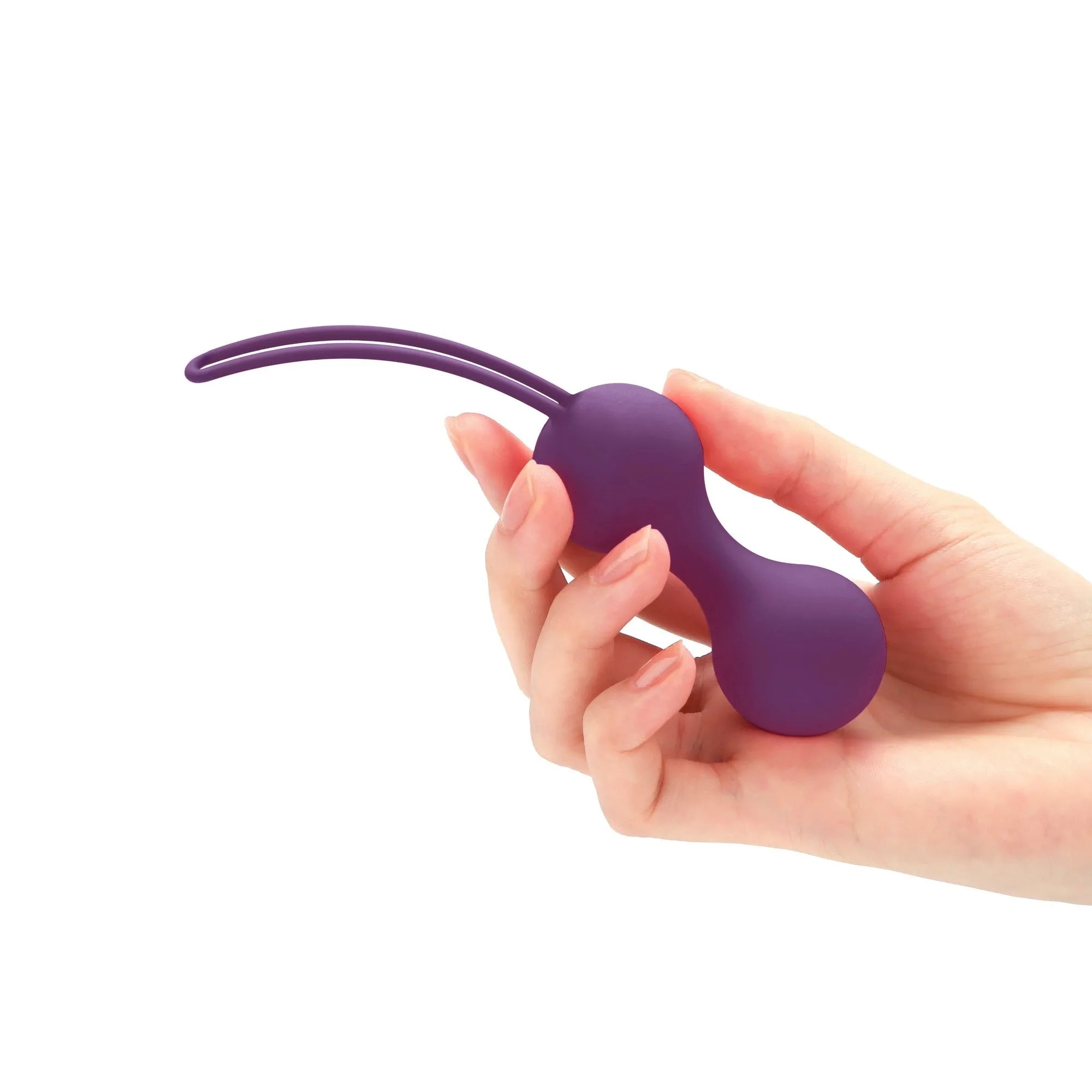 Boules de Geisha Per'Fit'Kit violettes en silicone, ergonomiques, pour entraînement périnéal discret et progressif.