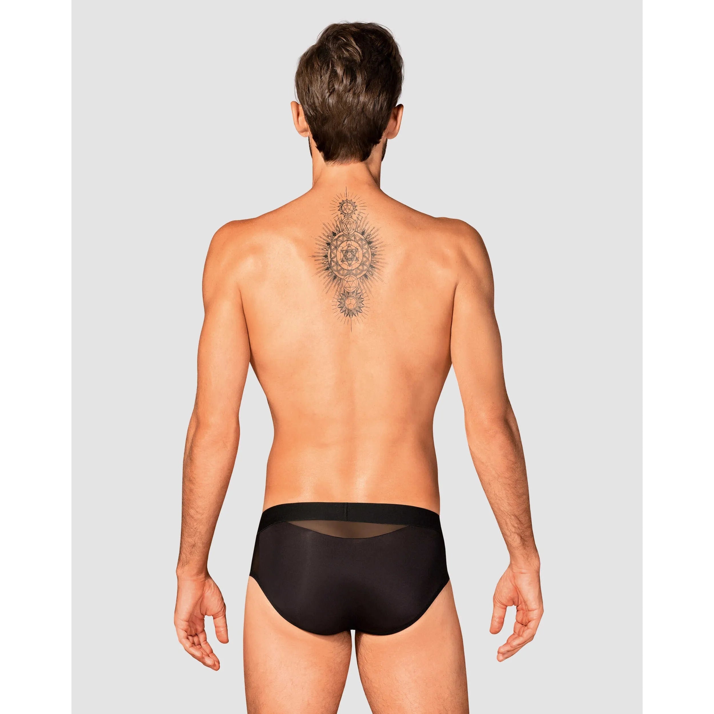 Slip noir Boldero homme, matière lisse et maille, coupe classique, pendentif élégant, confort et style séduisant.