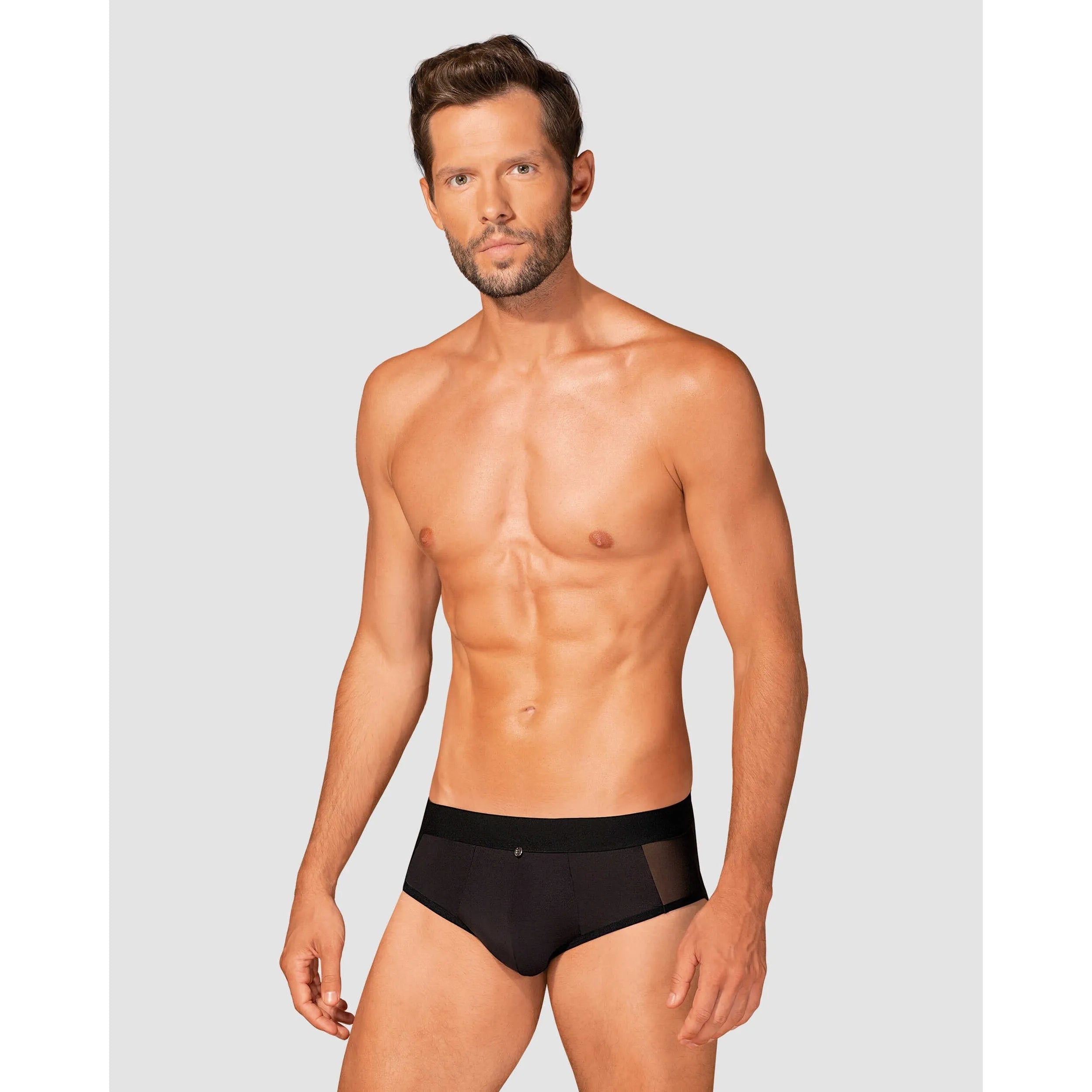 Slip Boldero noir homme, maille transparente, coupe classique, pendentif élégant, confort et style séduisant.