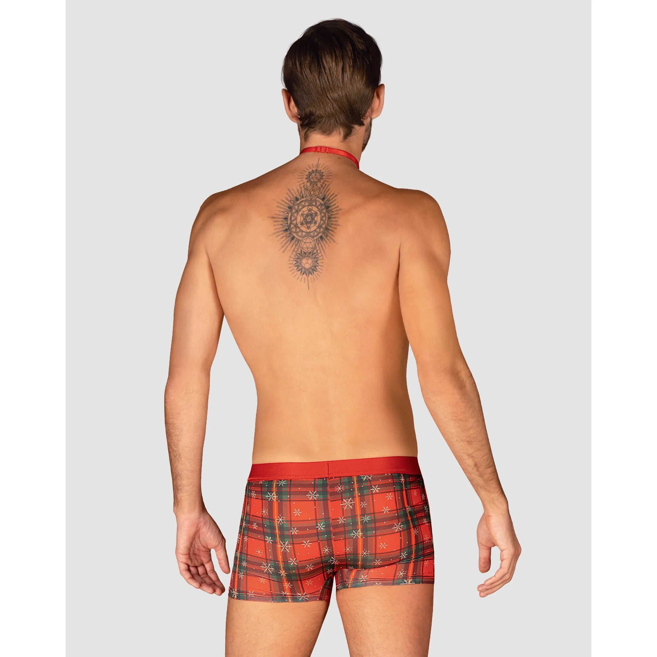 Boxer Noël homme rouge à motif festif, avec nœud papillon et pendentif or, idéal pour les fêtes de fin d'année.