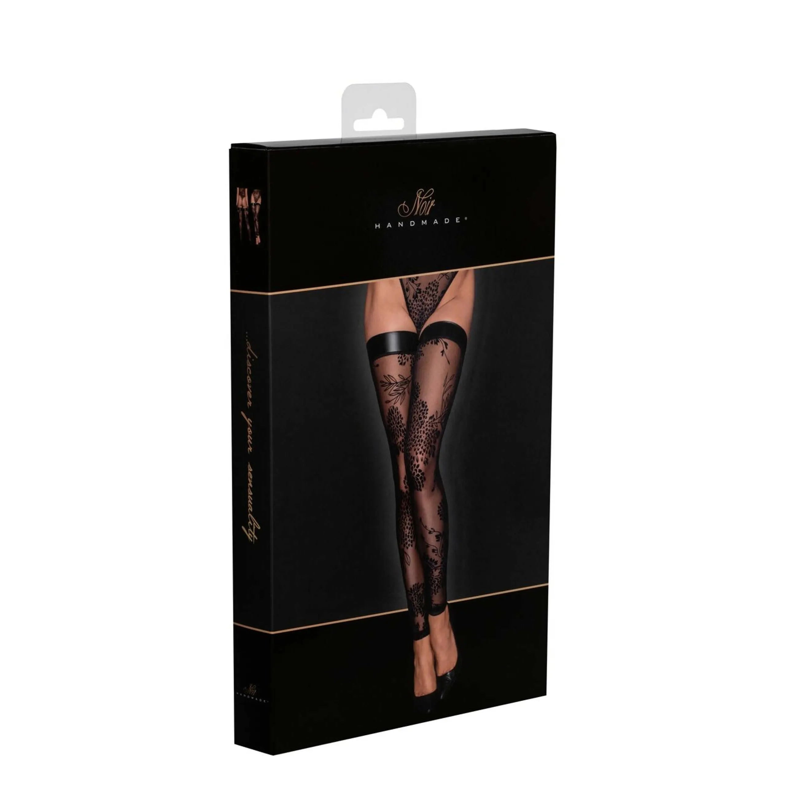 Bas noirs en tulle avec broderie florale élégante, transparents, sur fond noir, dans un emballage chic pour soirée.