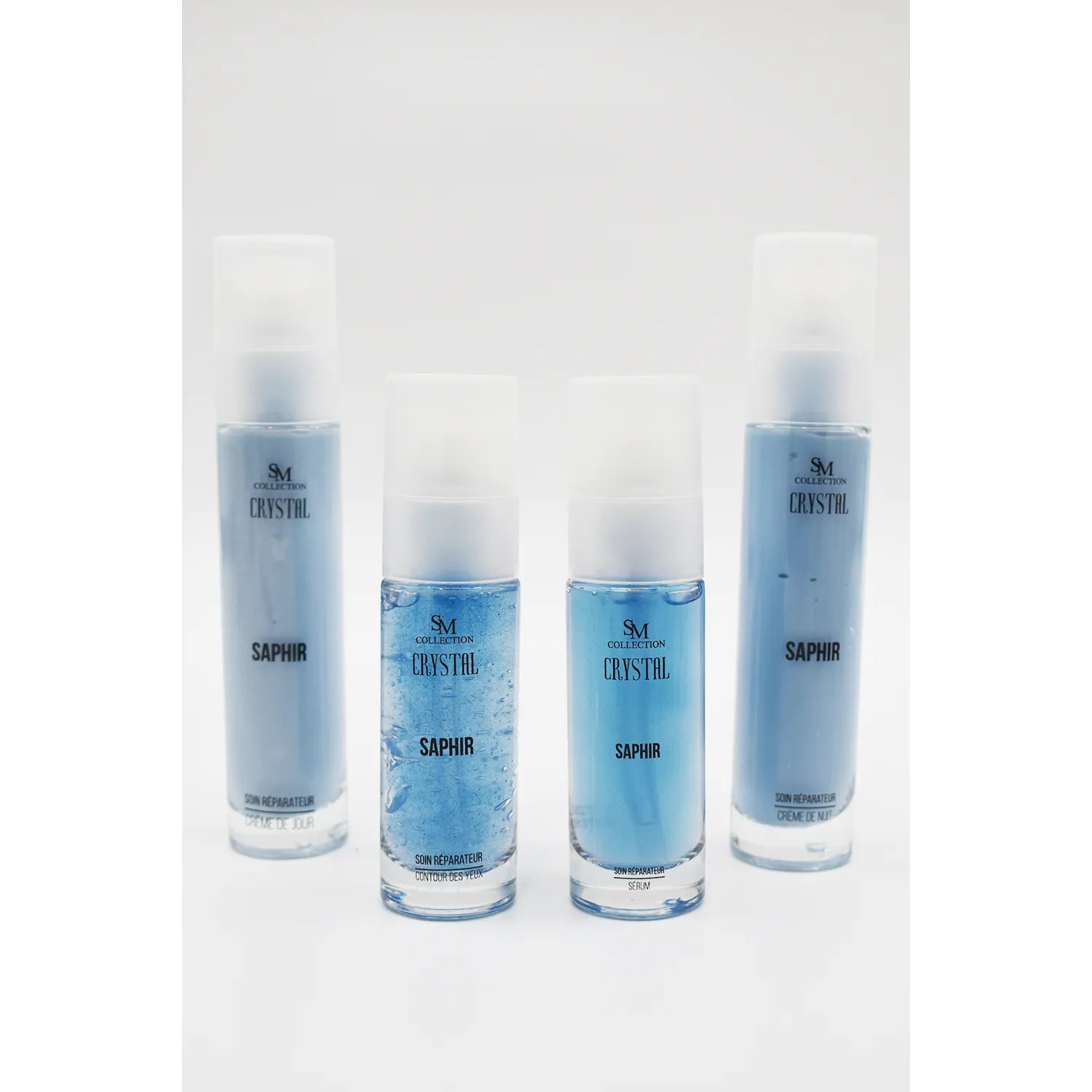 Flacons de crème réparatrice contour yeux, bleu translucide, poudre de saphir, pour peau mature acnéique.