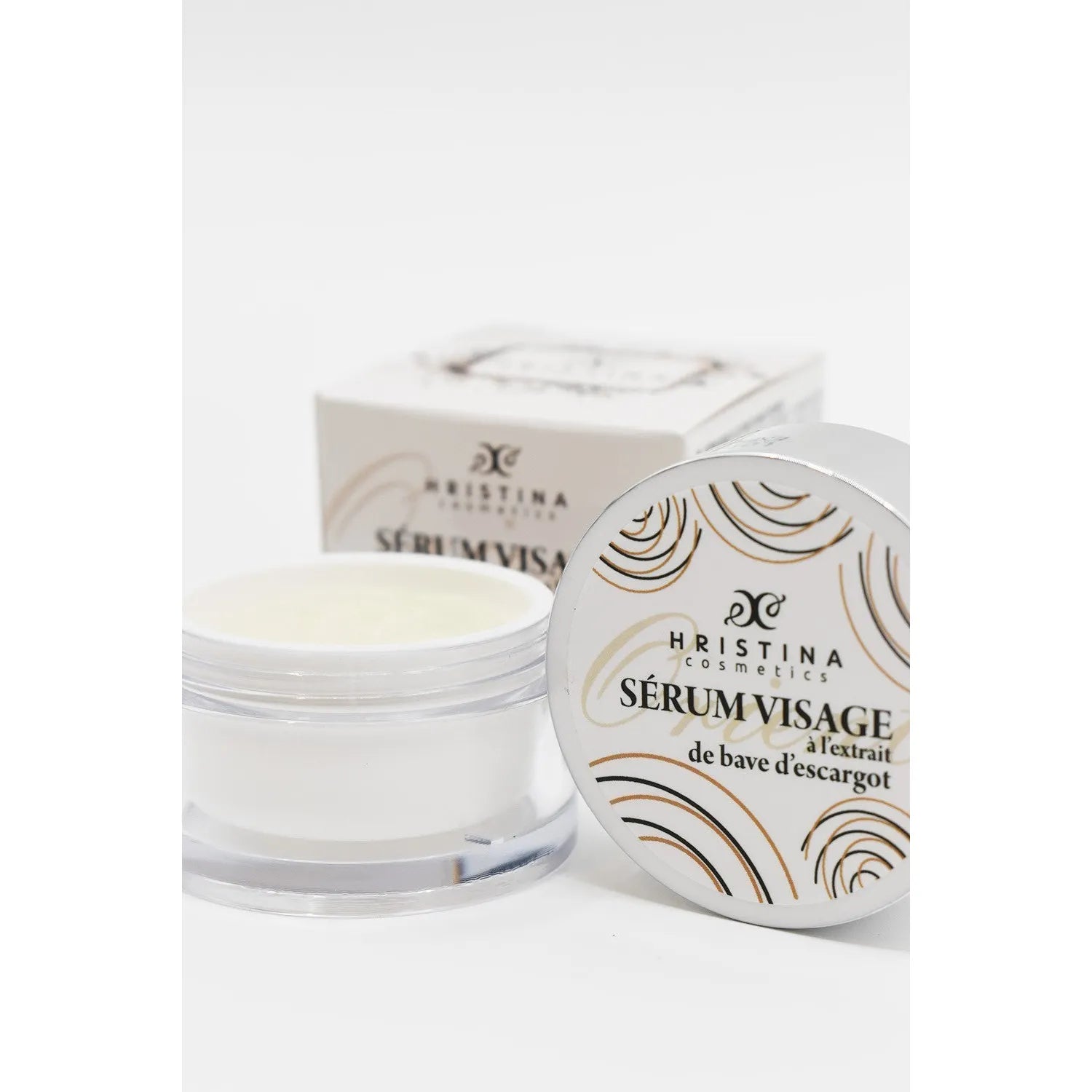 Sérum visage bave d'escargot, pot blanc, packaging élégant, soin anti-âge hydratant peau mature naturelle.