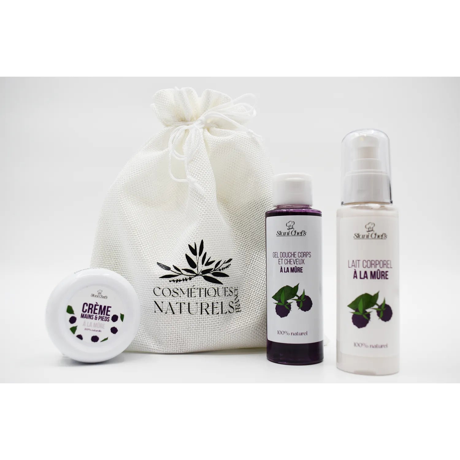 Coffret découverte mûre gourmande avec lait corporel, gel douche et crème, emballage blanc et flacons violets.