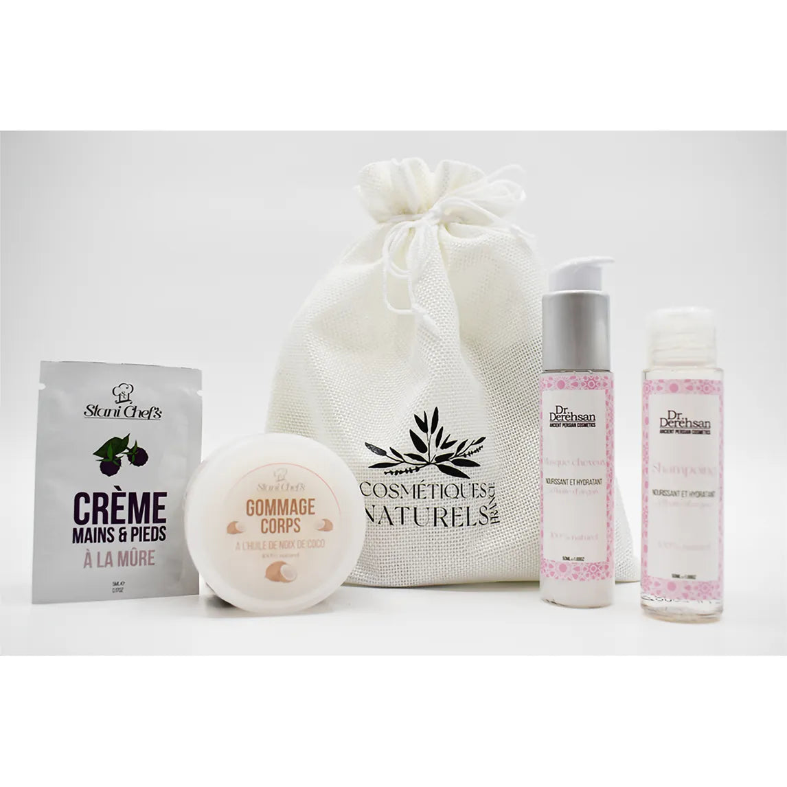 Coffret découverte corps cheveux avec shampoing à l'huile d'argan, crème, gommage, et sac en toile blanche.