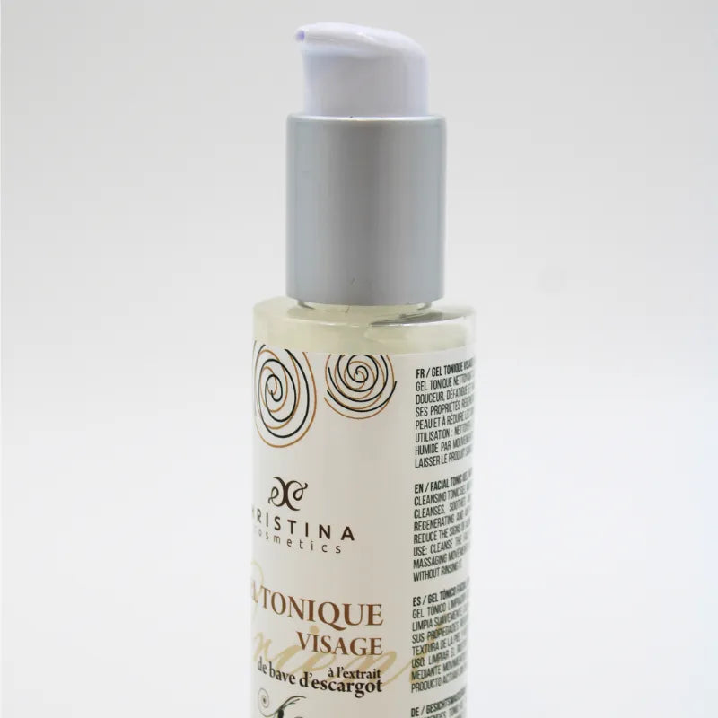 Flacon de gel tonique visage à la bave d'escargot, 125ml, bouchon pompe blanc, étiquette beige avec motifs dorés.
