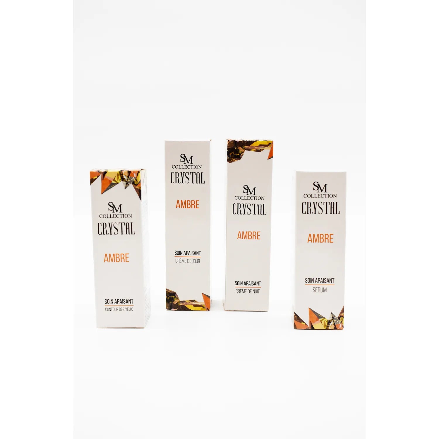 Crème contour yeux ambre naturel, emballage blanc et orange, 30ml, pour peau sensible, anti-rougeurs, hydratante.