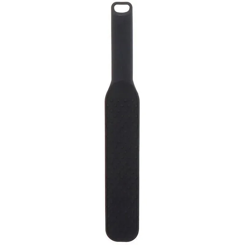Paddle BDSM noir en silicone avec pointes, design ergonomique, pour sensations intenses, collection EXTREME HIDDEN DESIRE.