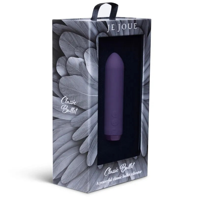 Vibromasseur violet mains libres rechargeable, design élégant, dans une boîte noire avec motifs de plumes.