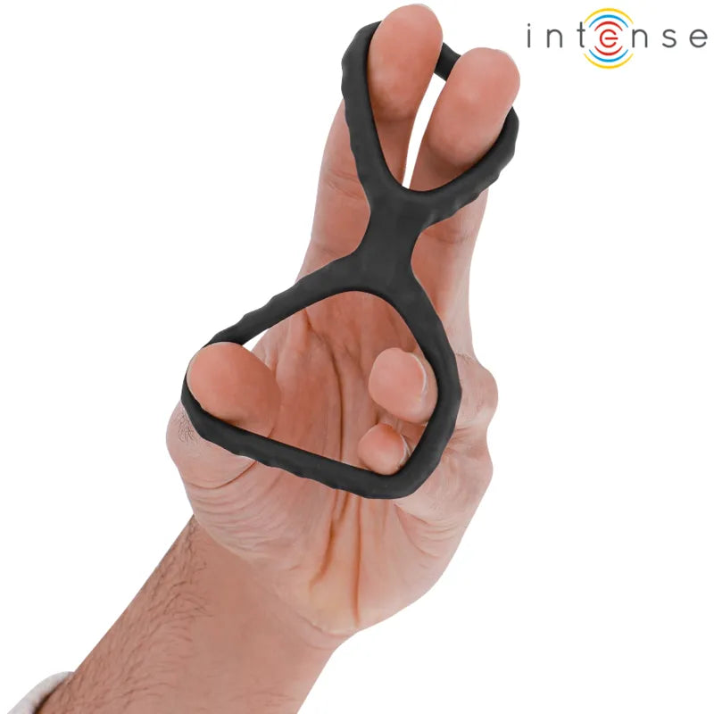Anneau double silicone noir, forme ergonomique, deux tailles distinctes, pour performance intime, confort et fermeté.