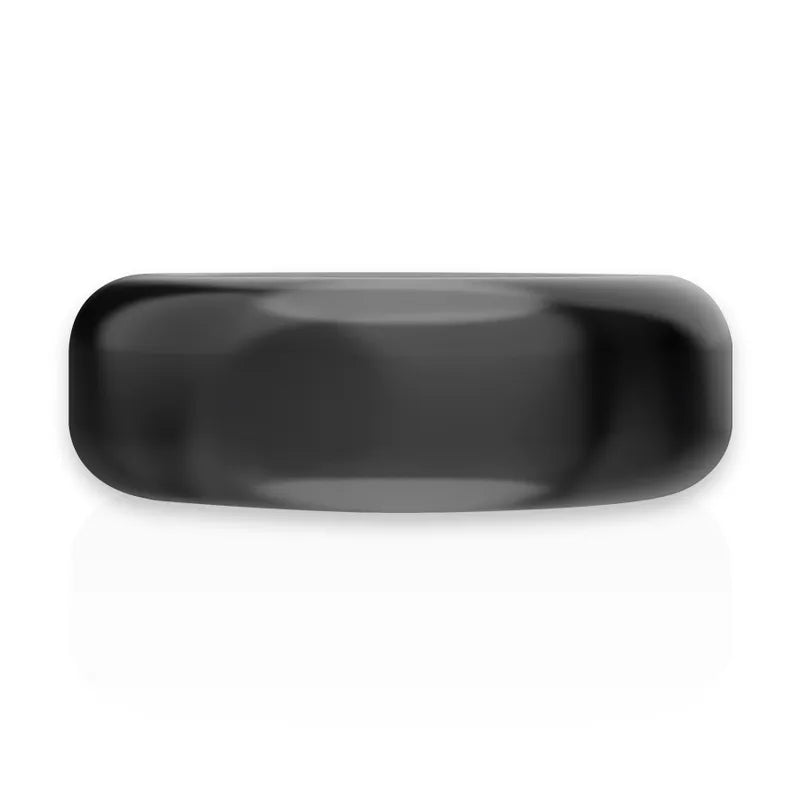 Anneau pénien noir TPE hypoallergénique, forme lisse et circulaire, conçu pour performance prolongée et confort optimal.