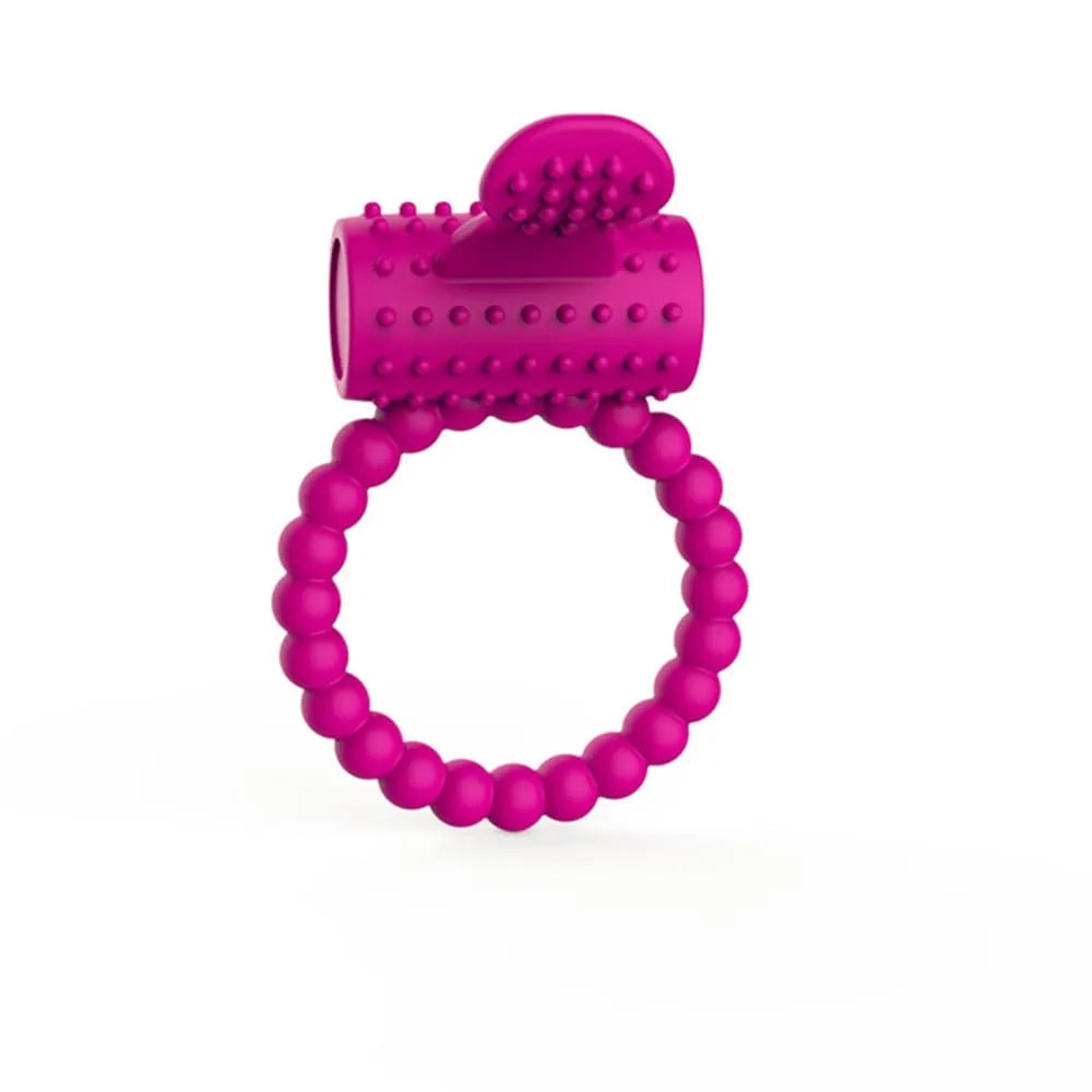 Anneau vibrant fuschia en silicone avec picots, moteur puissant et langue stimulante pour plaisir partagé.