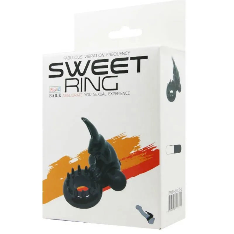 Anneau vibrant noir en silicone avec lapin stimulateur sur emballage blanc, conçu pour couples recherchant nouvelles sensa...