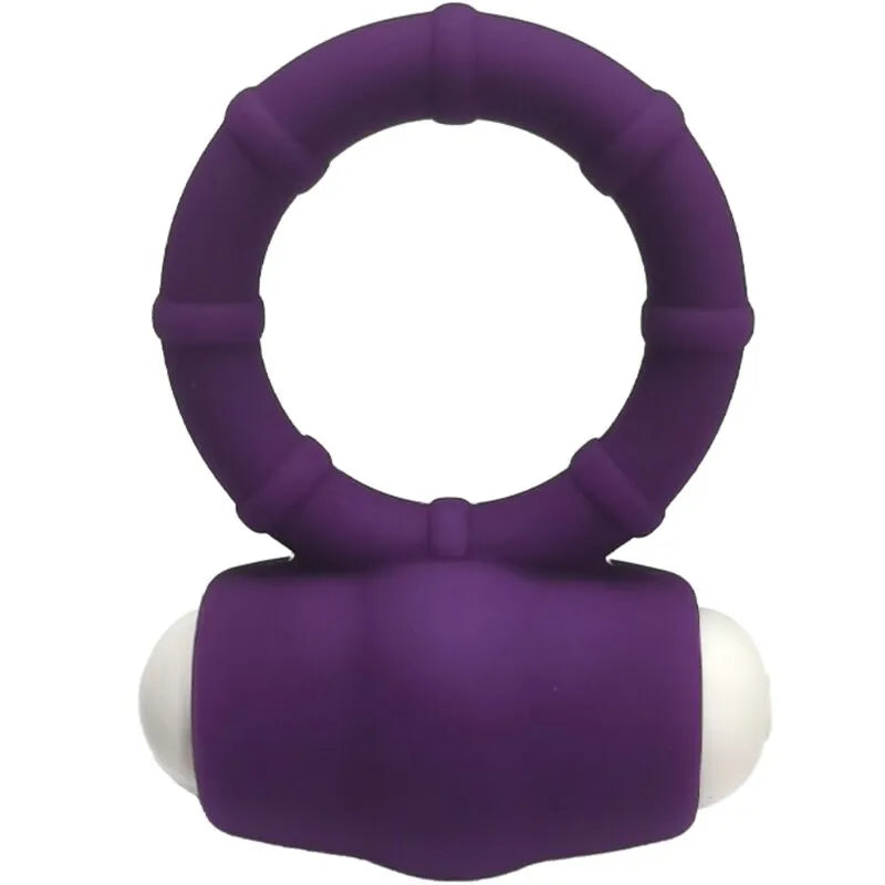 Anneau vibrant submersible en silicone médical violet, forme circulaire avec détails texturés, idéal pour plaisir aquatique.