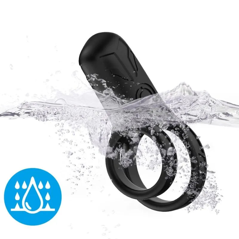 Anneau vibrant noir en silicone médical, étanche, avec 9 modes de vibration, immergé dans l'eau, symbole d'étanchéité.