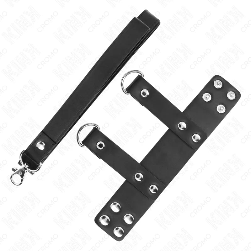 Anneaux péniens en cuir noir ajustable avec boutons-pression, design BDSM, pour expérience intense et personnalisée.