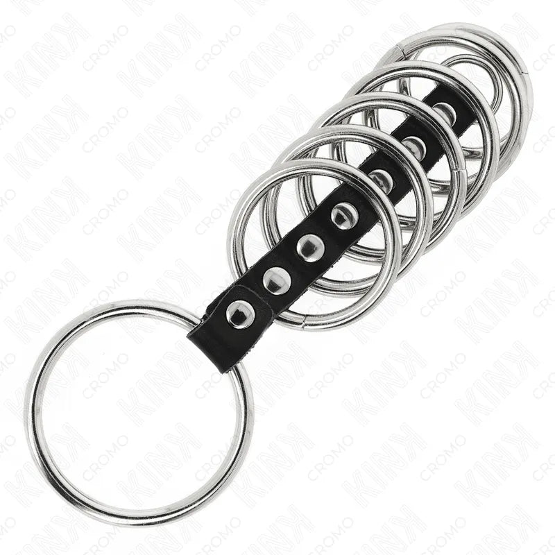 Anneaux péniens en cuir noir ajustables, design élégant et fonctionnel pour expériences BDSM, détails métalliques visibles.