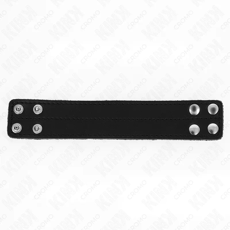 Anneau pénien cuir noir ajustable avec boutons pression, accessoire BDSM sophistiqué pour confort et plaisir.