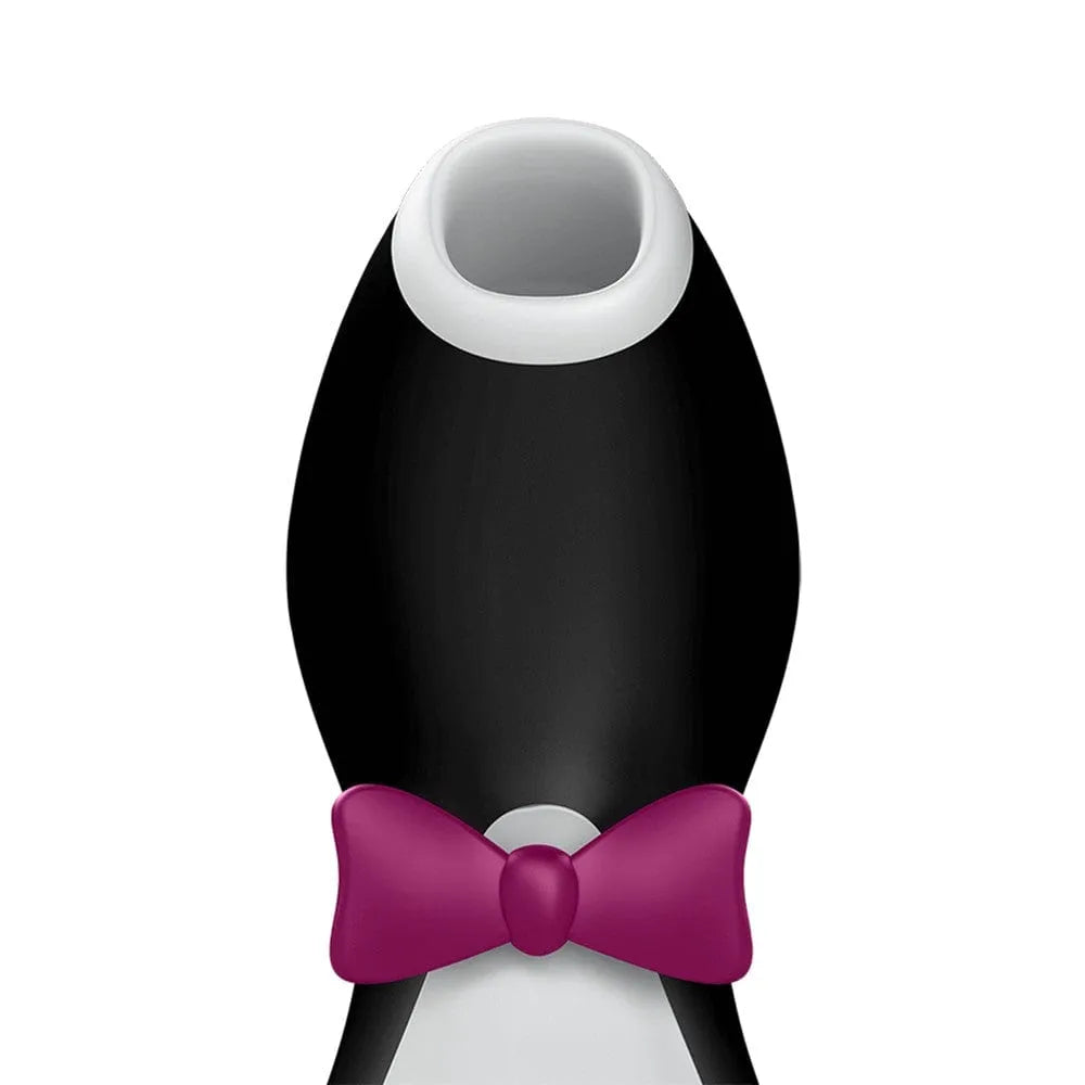 Stimulateur clitoridien Aspire Clito en forme de pingouin noir avec nœud papillon rose, silicone doux, waterproof.