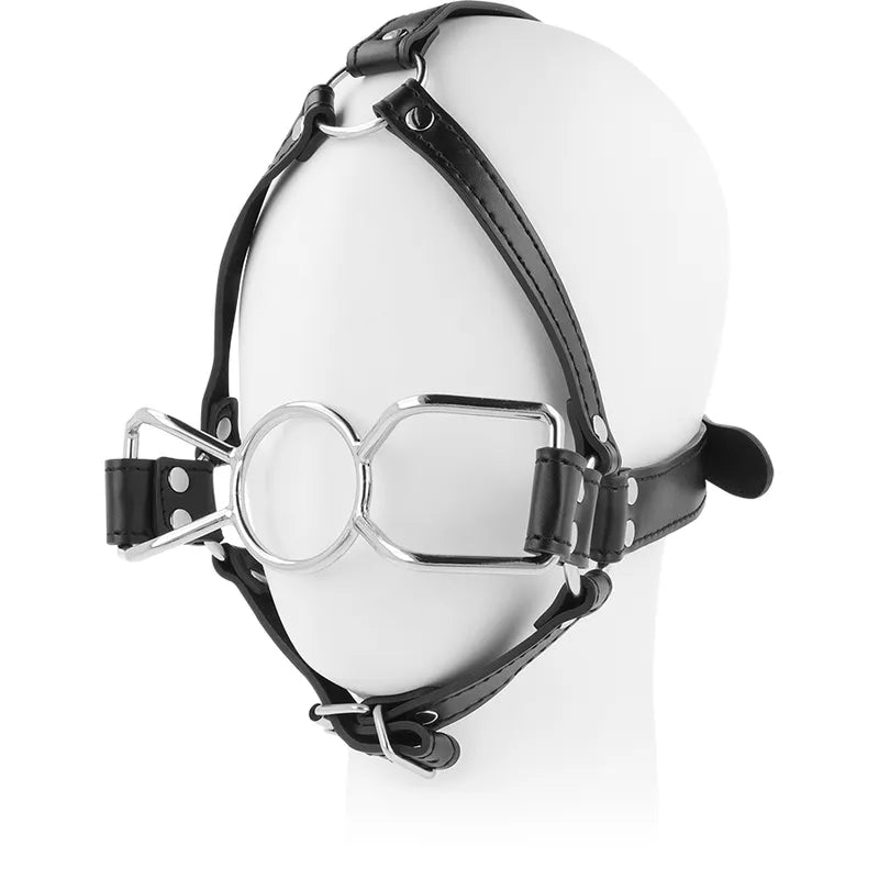 Bâillon harnais BDSM en acier inoxydable avec sangles noires ajustables, design robuste et confortable pour jeux fétichistes.