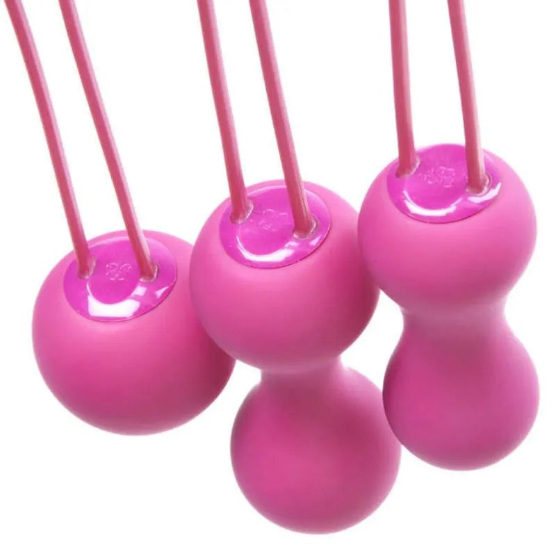 Balles Kegel roses à tonification progressive, trois niveaux de poids, pour renforcement du plancher pelvien.