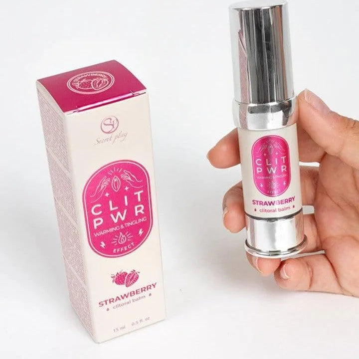 Baume stimulant clitoris fraise, flacon argenté, boîte rose, intensité vibrante, plaisir féminin, absorption rapide.