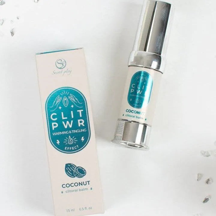Baume stimulant clitoris noix de coco chaleur, flacon argenté et boîte blanche avec logo bleu, intensifie les sensations.