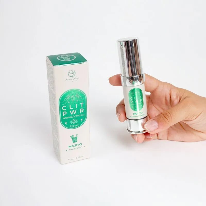 Baume stimulant clitoris chauffant, flacon argenté et vert, intensifie plaisir féminin, packaging élégant.