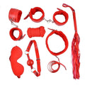 kit BDSM rouge débutants bondage soumission menottes poignets chevilles réglables fausse fourrure corde douce fouet bâillon collier laisse