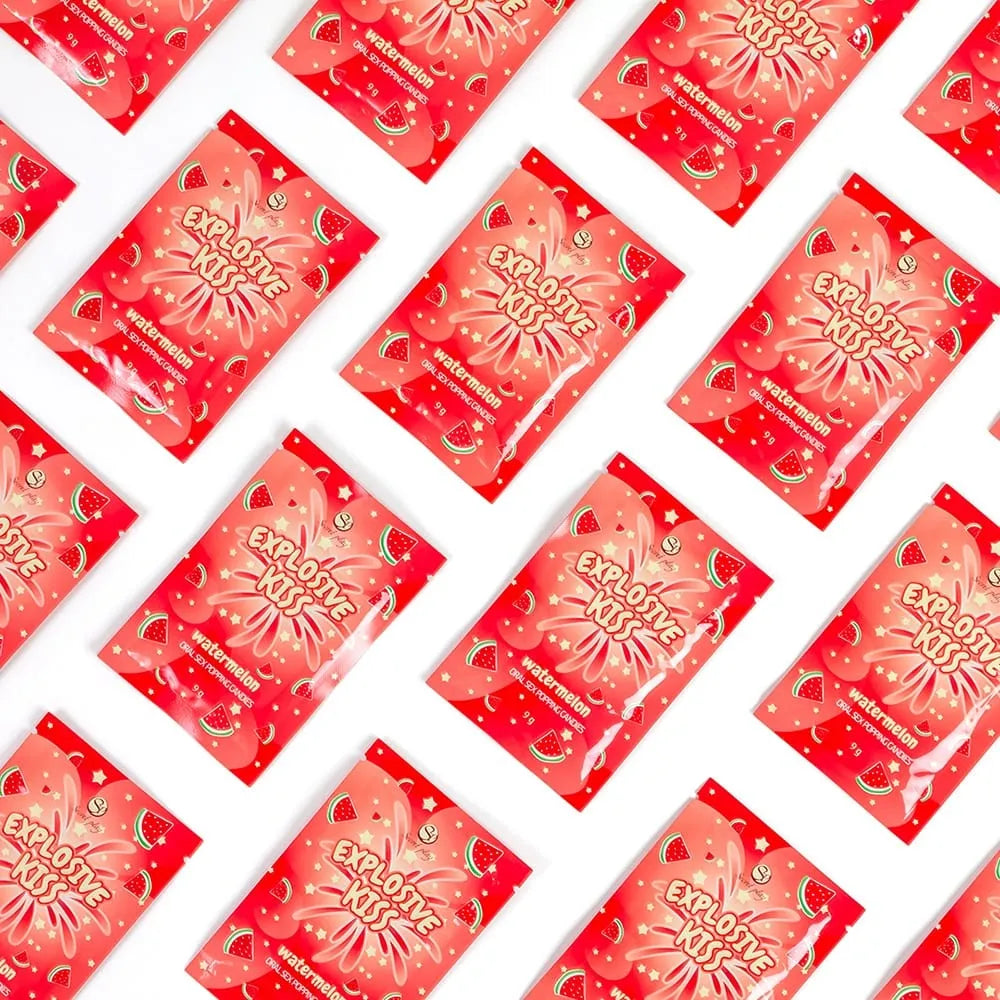 Bonbons pétillants pastèque pour sexe oral, emballages rouges avec motifs pastèque, plaisir intime et rafraîchissant.