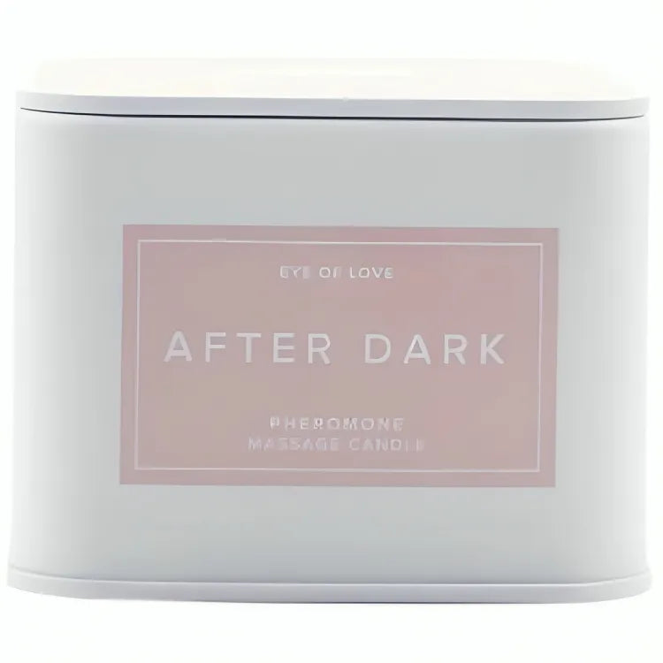 Bougie de massage blanche, étiquette rose After Dark, enrichie de phéromones naturelles, pour éveiller les sens.