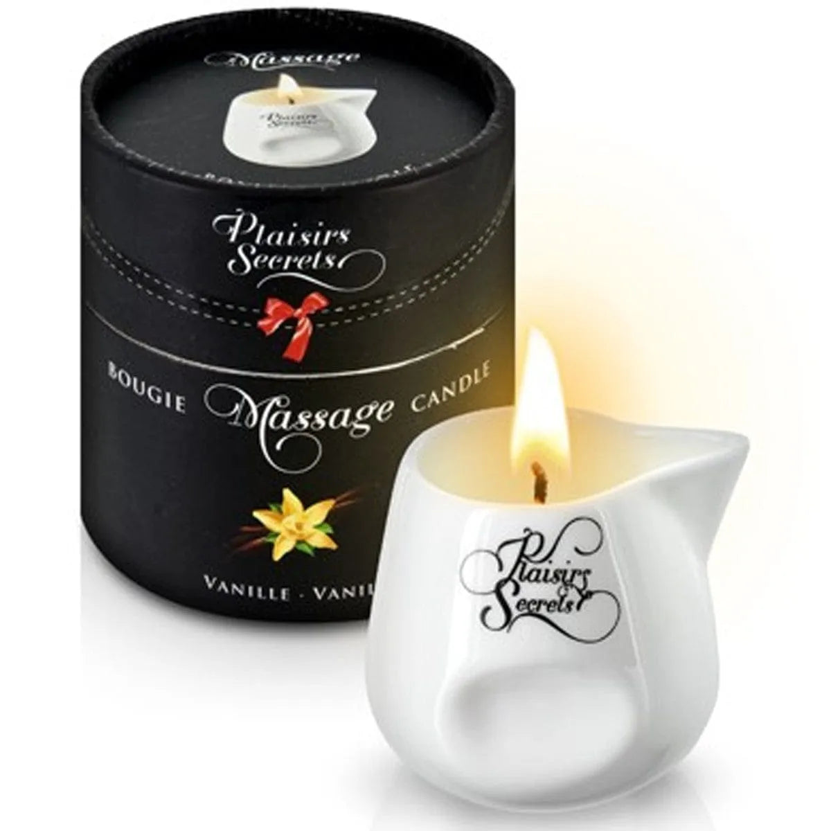 Bougie de massage vanille en cire végétale française, pot blanc élégant, flamme allumée, boîte noire décorative.