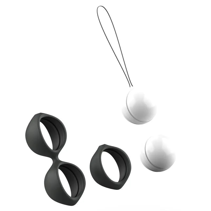 Boule de Geisha en silicone noir avec poids ajustables blancs pour entraînement pelvien et bien-être intime.