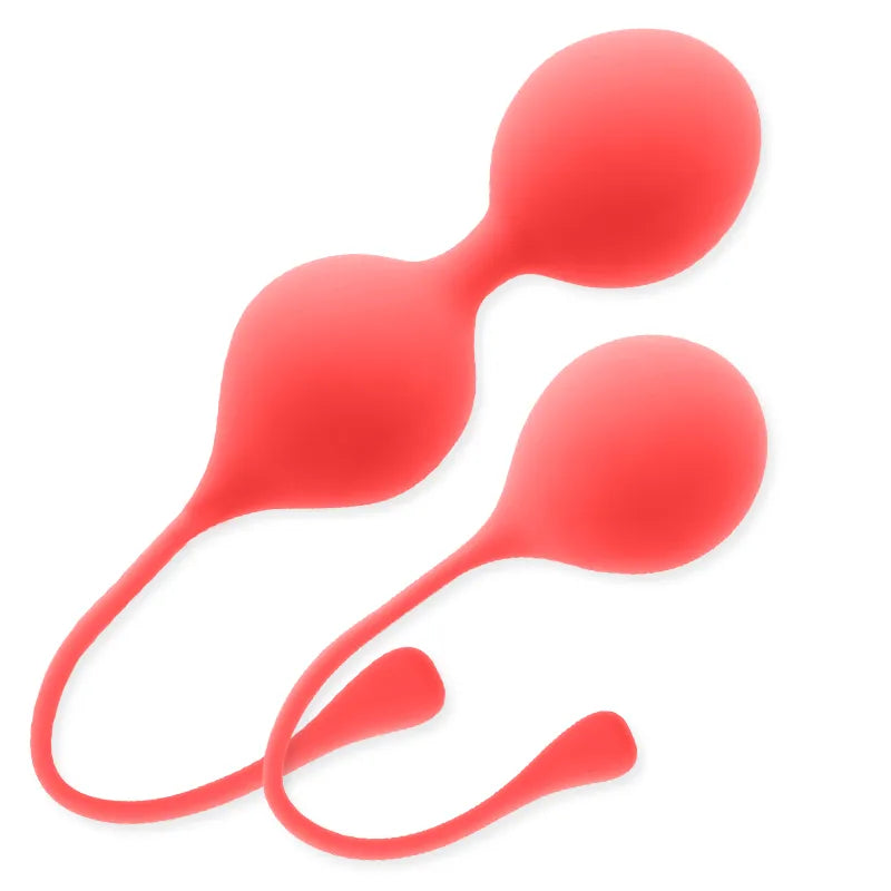 Boules chinoises en silicone rouge pour renforcement pelvien, design ergonomique avec cordon, toucher velours.