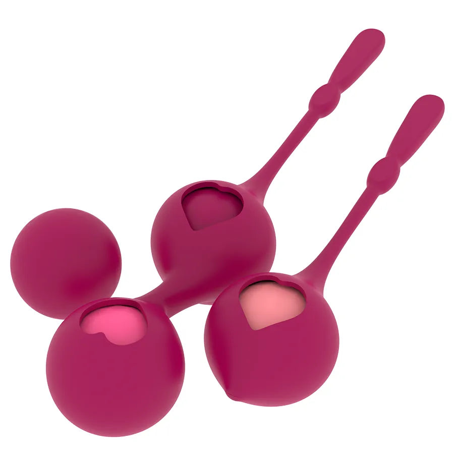Boules Geisha en silicone médical rose, quatre poids variés, design ergonomique pour renforcement pelvien.