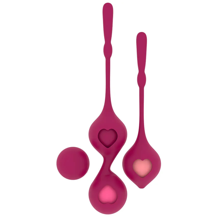Boules Geisha roses en silicone médical, formes variées, cœurs visibles, pour renforcement pelvien.
