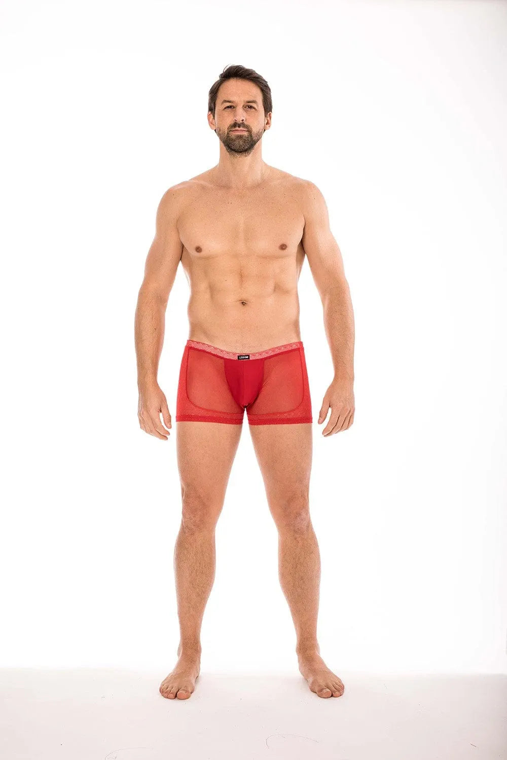 Boxer rouge transparent pour homme en résille et dentelle, élégant et confortable, composition 80% polyamide, 20% spandex.