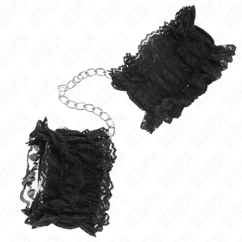 Bracelets BDSM noirs en cuir végétalien avec chaîne argentée, design élégant et confortable pour sessions éthiques.