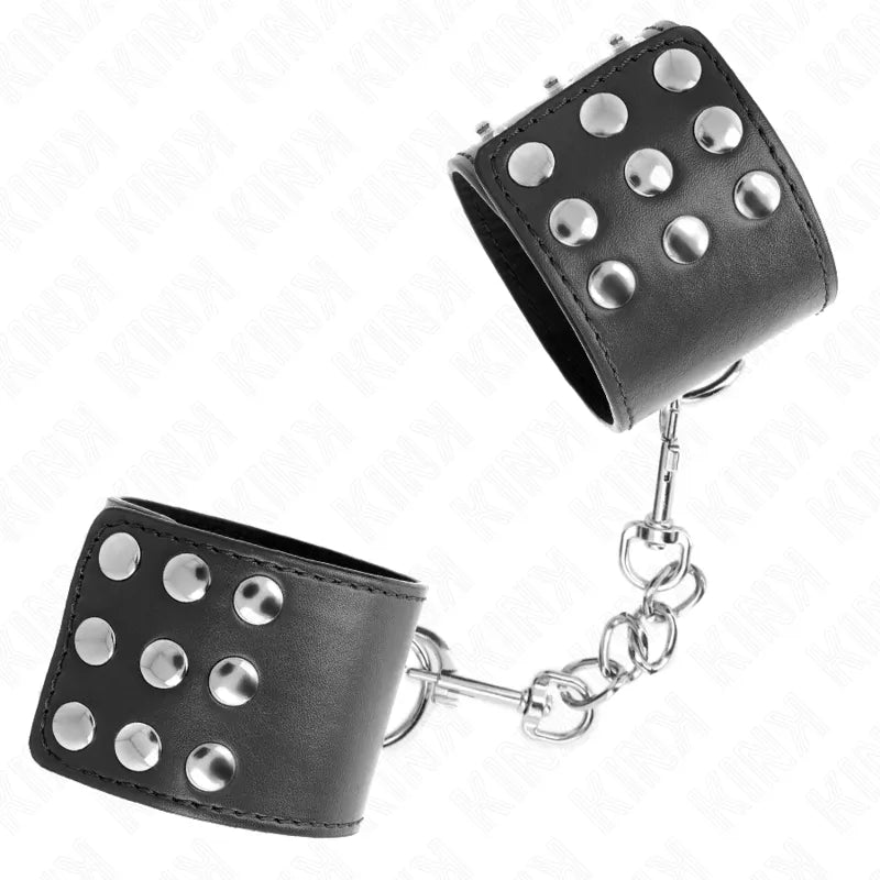 Bracelets BDSM en cuir noir avec rivets métalliques, chaîne argentée, élégance et résistance pour séances intenses.