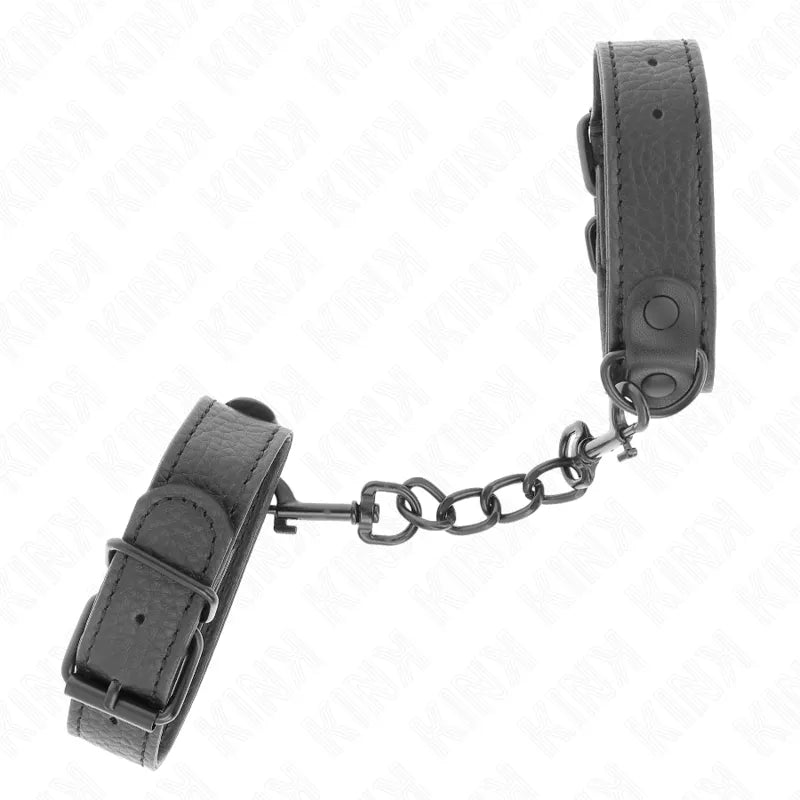 Bracelets BDSM en cuir noir ajustables avec chaîne, design haut de gamme, pour sessions sensuelles et confortables.