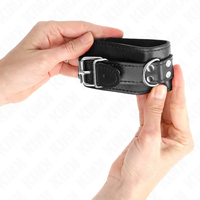 Bracelet BDSM en cuir noir élégant avec boucle métallique, design raffiné et durable, idéal pour style et confort.