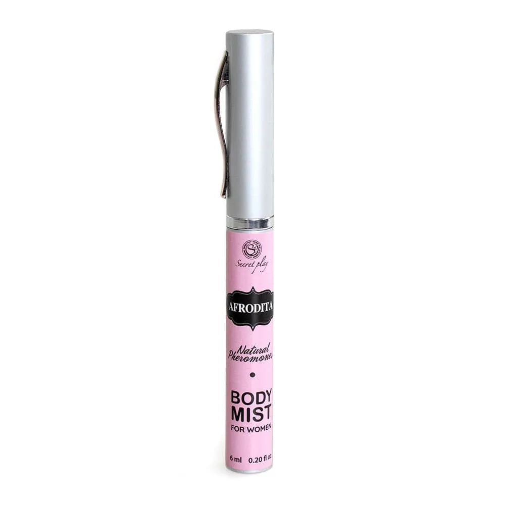 Flacon rose de brume corporelle aphrodisiaque à la truffe, hydratation et séduction, design élégant et moderne.