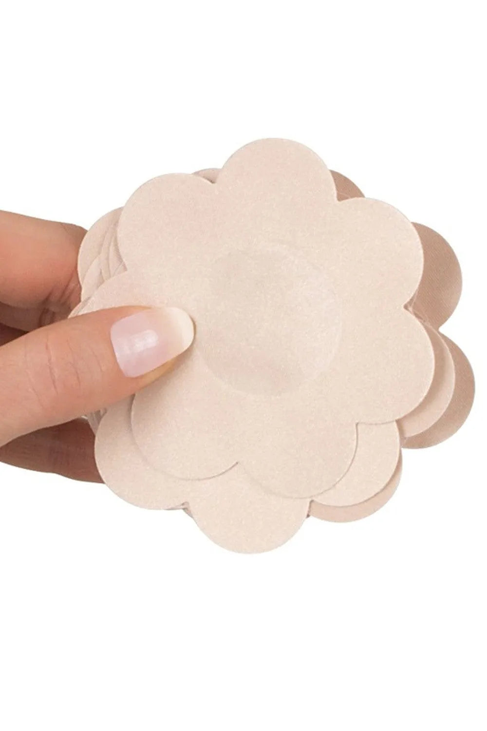 Cache tétons adhésifs floraux en silicone beige, discrets et pratiques pour tenues moulantes et transparentes.