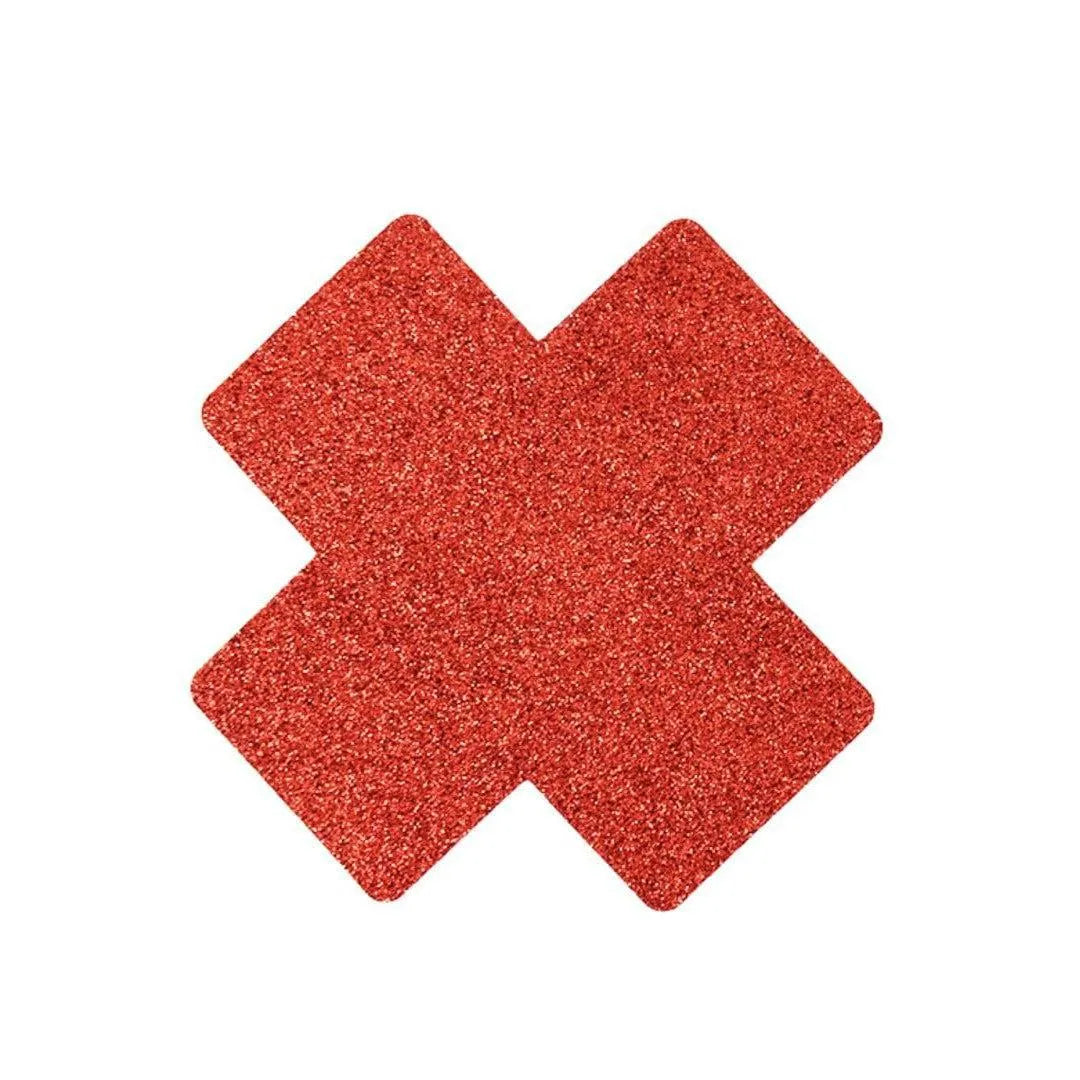 Cache-tétons croix rouge pailletée, forme scintillante, accessoire glamour pour sublimer le décolleté.