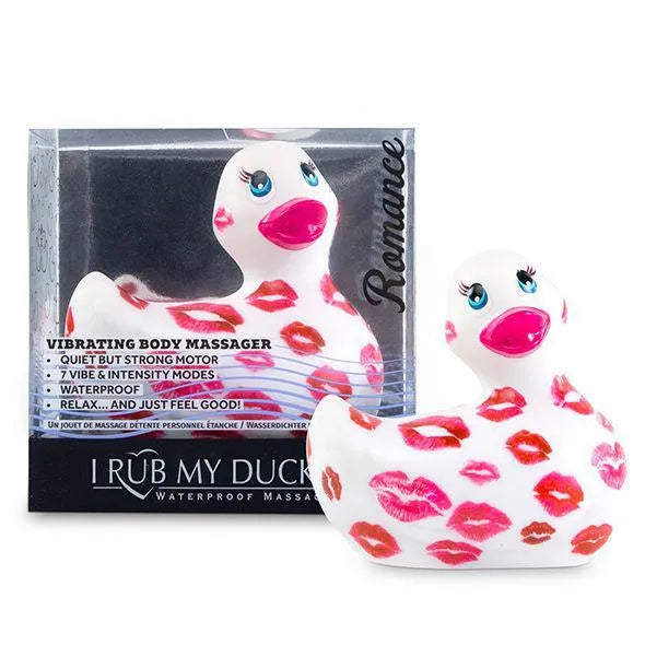 Canard vibrant étanche blanc avec motifs lèvres rouges, idéal pour massage relaxant et moments romantiques.