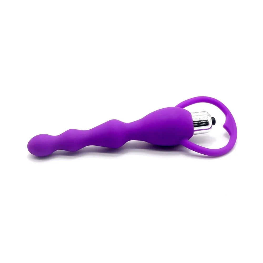 Chapelet anal violet ondulé avec poignée et bullet vibrant, en silicone médical, pour plaisir sensuel et sécurisé.