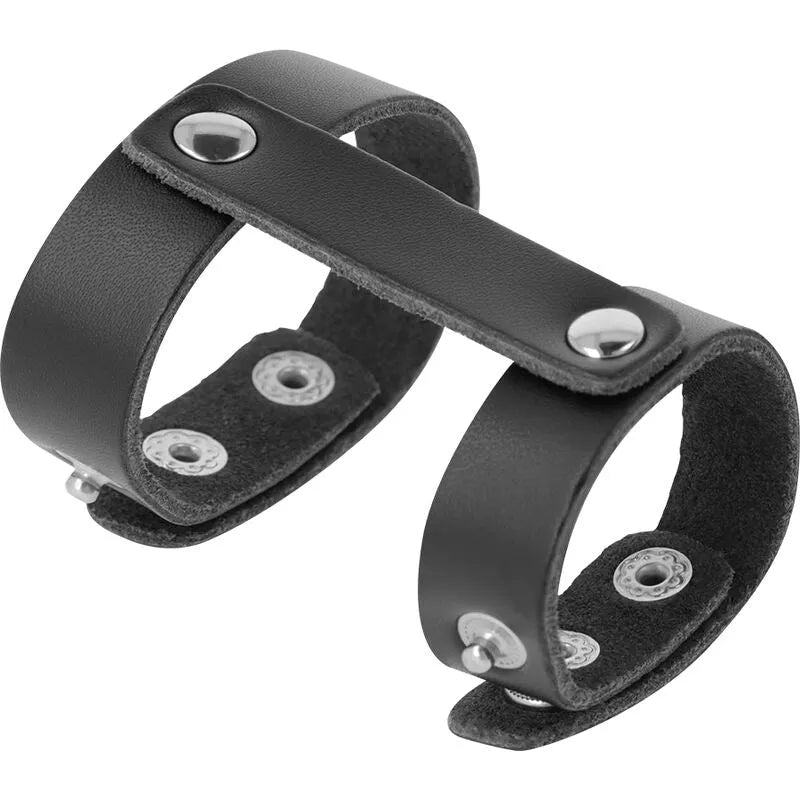 Cockring cuir synthétique noir réglable pour BDSM débutants, design élégant avec boutons pression argentés.