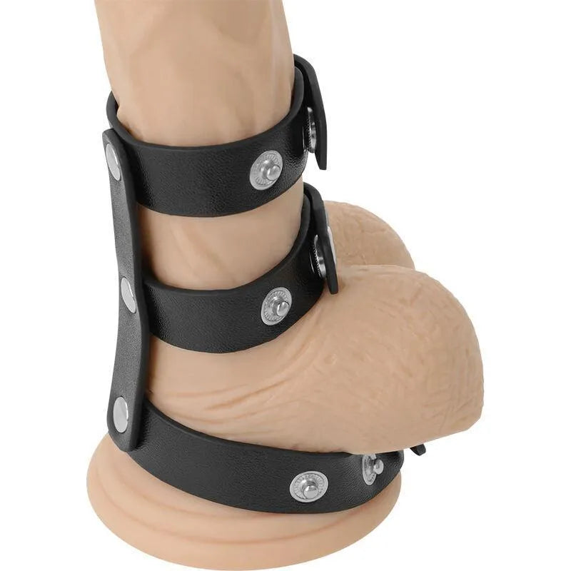 Cockring noir en cuir synthétique ajustable avec boutons-pression, conçu pour pénétrations intenses et sensations optimisées.