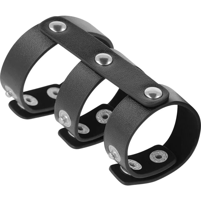 Cockring cuir synthétique noir, ajustable avec boutons-pression, pour pénétrations intenses et sensations optimisées.