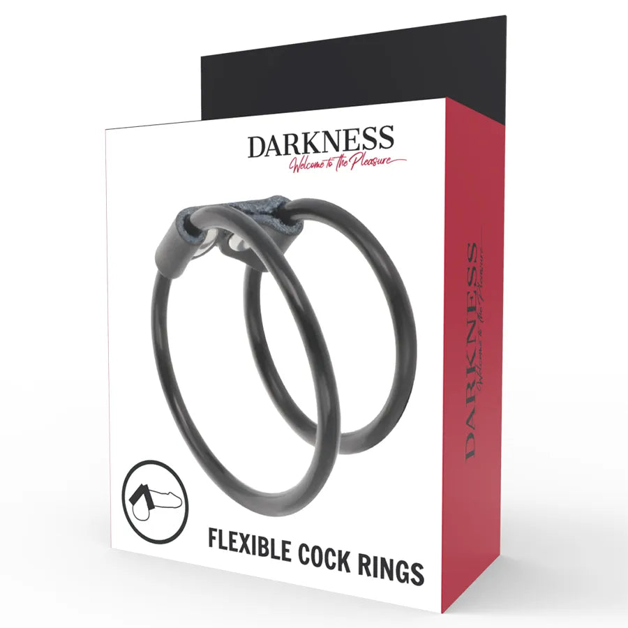 Cockring double en cuir et caoutchouc noir pour éjaculation retardée, sur fond blanc, dans un emballage rouge et noir.